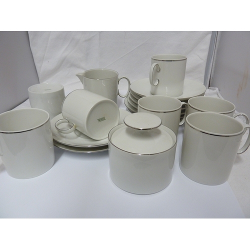 88 - A Thomas coffee service, white with silver borders, comprises: seven mugs, eight saucers; sugar bowl... 