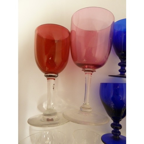 116 - Various glass wares; four Bristol blue rummers; two cranberry; six cut glass ports; and other glassw... 