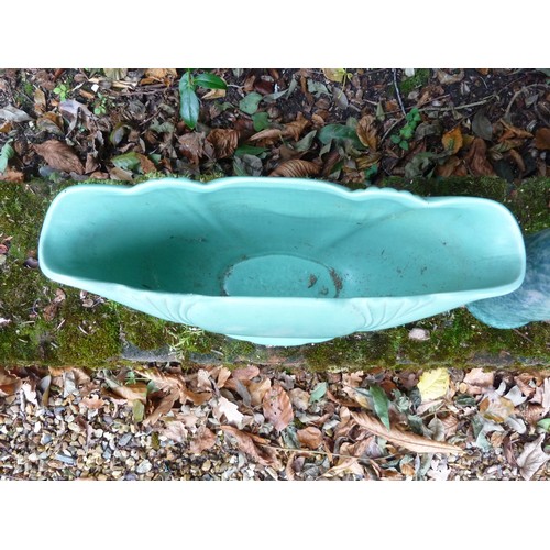 89 - Two Dartmouth Pottery flower trough vases, green glazed; and a Denby green glazed tall water jug (3)