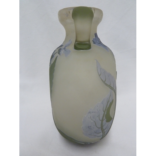 33 - Galle - a large three colour glass vase, of moon flask shape with handles cut with flowers, 21.5 cm ... 