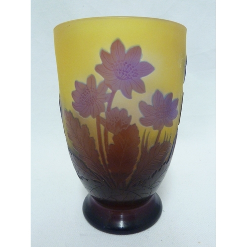 34 - Galle - a cameo glass vase decorated with blue flowers on a yellow ground, 15cm high.