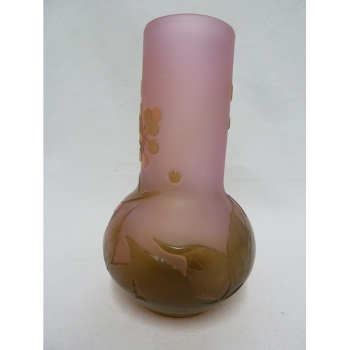 35 - Galle - A cameo glass vase, decorated with green flowers on a pink opalescent ground, 15cm high