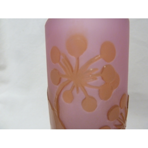 35 - Galle - A cameo glass vase, decorated with green flowers on a pink opalescent ground, 15cm high