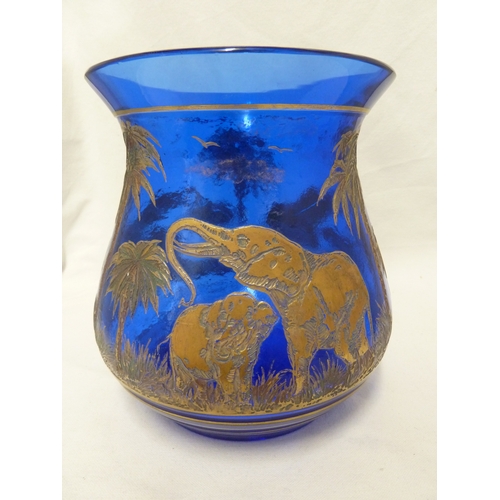 108 - Rudolf Weiss for Moser - A large blue glass vase from the animor series, of gilded elephants within ... 