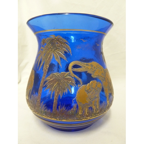 108 - Rudolf Weiss for Moser - A large blue glass vase from the animor series, of gilded elephants within ... 