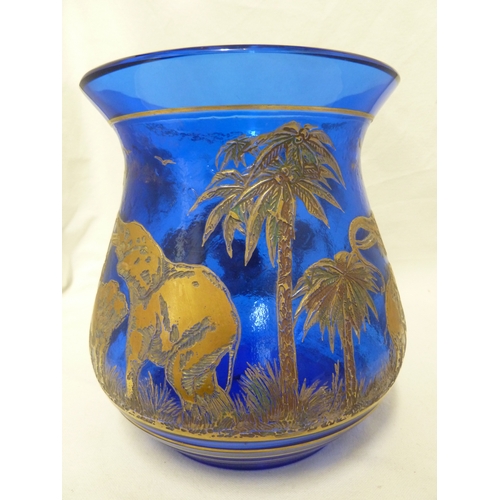 108 - Rudolf Weiss for Moser - A large blue glass vase from the animor series, of gilded elephants within ... 