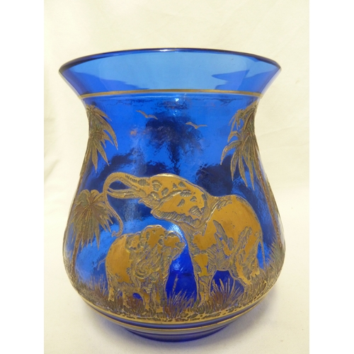 108 - Rudolf Weiss for Moser - A large blue glass vase from the animor series, of gilded elephants within ... 