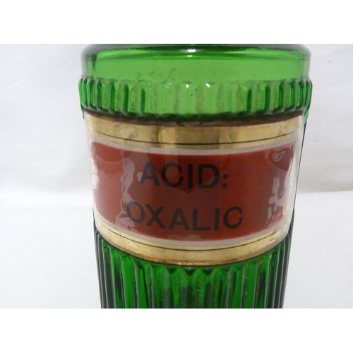 173 - A Green glass pharmacy bottle, labelled ACID: OXALIC, 19.5 cm high.