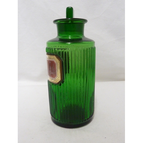 173 - A Green glass pharmacy bottle, labelled ACID: OXALIC, 19.5 cm high.