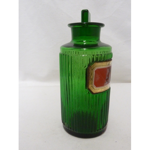 173 - A Green glass pharmacy bottle, labelled ACID: OXALIC, 19.5 cm high.