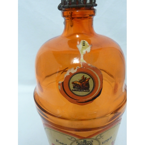 189 - A Gordon's Piccadilly Cocktail shaker, of orange glass, original paper labels and cover, 24cm high