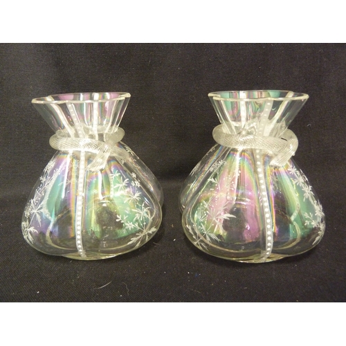 94 - Various Glass wares - A paif of iridescent money purse form vases, enamelled in white; an urn vase w... 