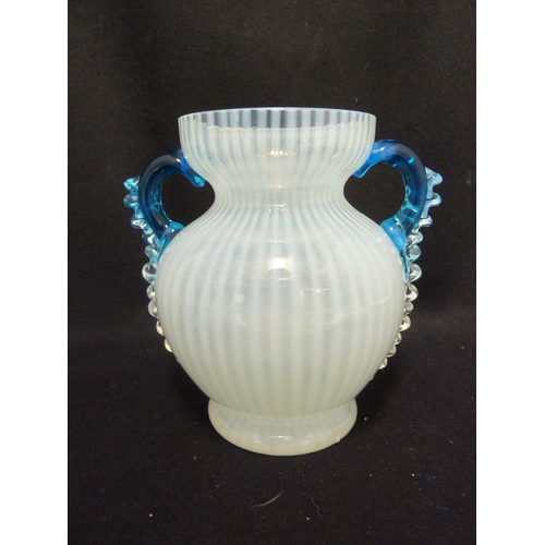 94 - Various Glass wares - A paif of iridescent money purse form vases, enamelled in white; an urn vase w... 