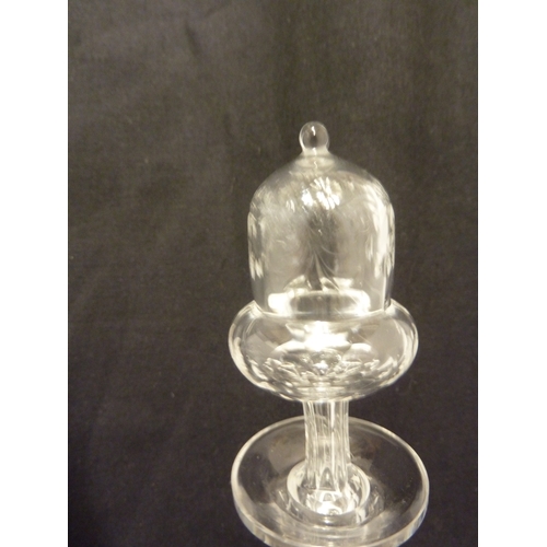 176 - Stevens and Williams - a pair of intaglio cut glass decanters, bell form with acorn form stoppers cu... 