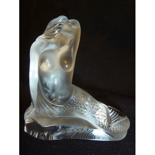 49 - Lalique - A Sirene, frosted glass figure, the mermaid seated and with arm raised, engraved mark to b... 