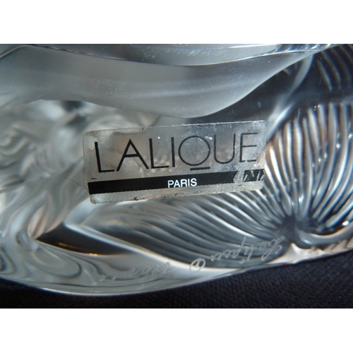 49 - Lalique - A Sirene, frosted glass figure, the mermaid seated and with arm raised, engraved mark to b... 