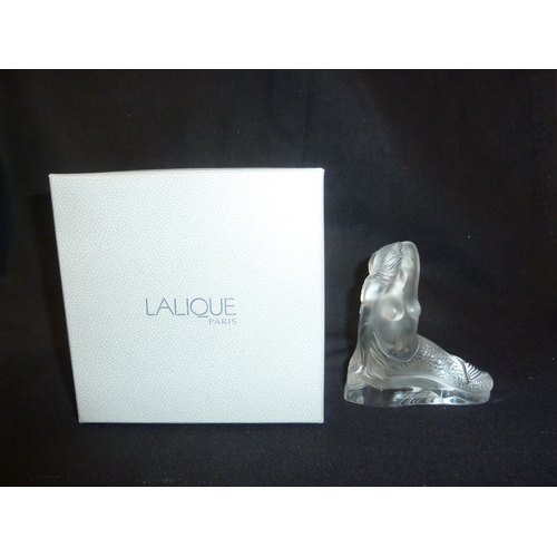 49 - Lalique - A Sirene, frosted glass figure, the mermaid seated and with arm raised, engraved mark to b... 