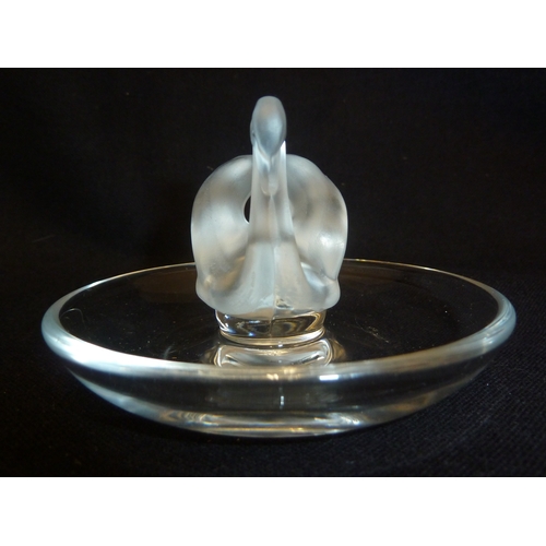 46 - Lalique - A swan cendrier, the frosted single bird on a circular colorless glass base, hand etched m... 