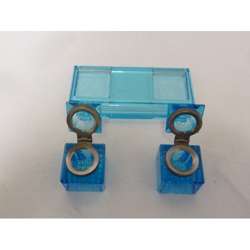 90 - A uranium blue glass desk set of pen tray than two removable inkwells, hinged metal mounts to inkwel... 