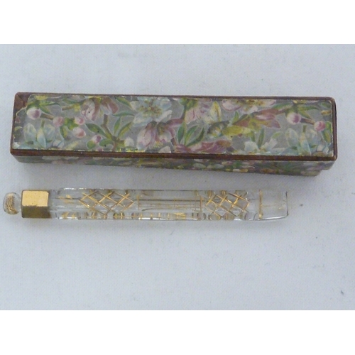 196 - A Victorian glass tear flask, cylindrical with gilt highlighted cutting; and a period paper box, box... 