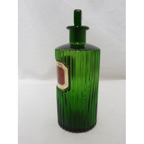 170 - A green glass pharmacy bottle, labelled ACET. CANTHAR., 17cm high.