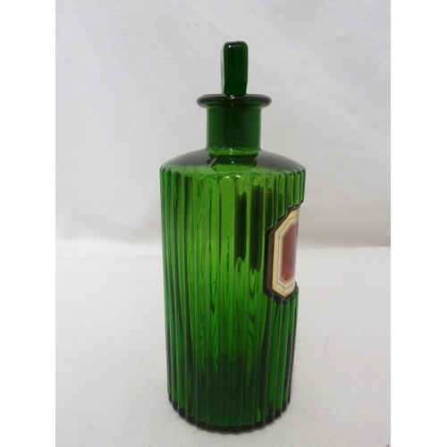 170 - A green glass pharmacy bottle, labelled ACET. CANTHAR., 17cm high.