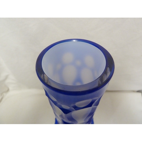 118 - A Czechoslovakian cameo glass chimney for an oil lamp, 
cobalt blue cut through to white, 13cm high