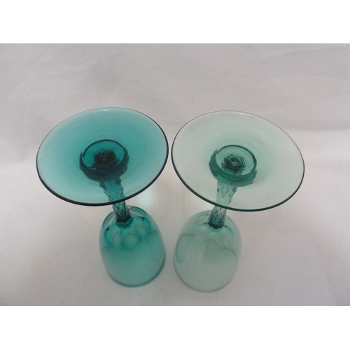 163 - A pair of uranium green wine glasses, with honeycomb cut stems, probably Richardsons (2)