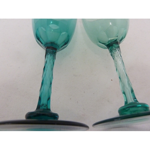 163 - A pair of uranium green wine glasses, with honeycomb cut stems, probably Richardsons (2)