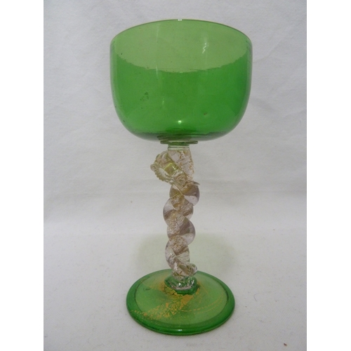 131 - Salviati - a serpent wine glass, the serpent coiled around the stem between a green glass bowl and f... 