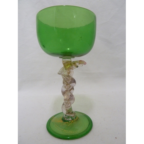 131 - Salviati - a serpent wine glass, the serpent coiled around the stem between a green glass bowl and f... 