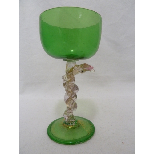 131 - Salviati - a serpent wine glass, the serpent coiled around the stem between a green glass bowl and f... 