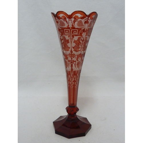 96 - A Bohemian overlay glass soli fleur, red and cut through to colourless glass with foliate 'c' scroll... 