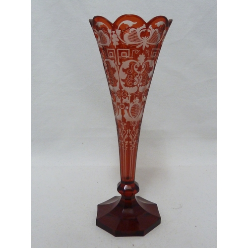 96 - A Bohemian overlay glass soli fleur, red and cut through to colourless glass with foliate 'c' scroll... 