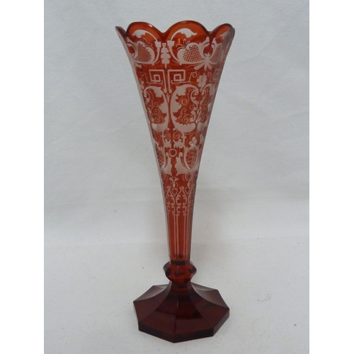 96 - A Bohemian overlay glass soli fleur, red and cut through to colourless glass with foliate 'c' scroll... 