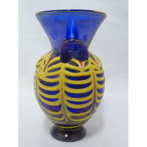 133 - A Salviati Egyptian glass vase, the iridescent blue glass ovoid body with wide trumpet neck and trai... 