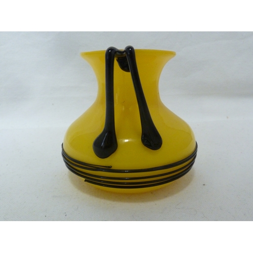 104 - Loetz - a Tango glass vase, yellow over white with black trails, 9.5cm high approx.