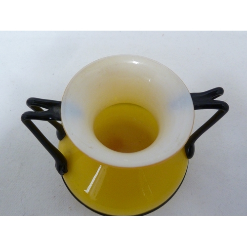 104 - Loetz - a Tango glass vase, yellow over white with black trails, 9.5cm high approx.