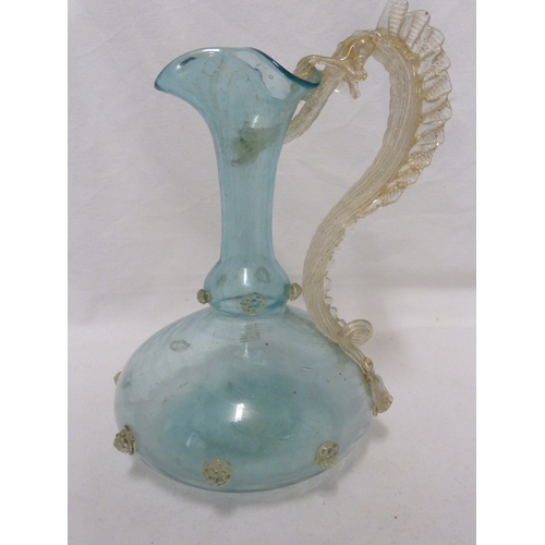 146 - A Venetian glass Dragon jug, of globe and shaft shape the coiled dragon forming the handle, the body... 