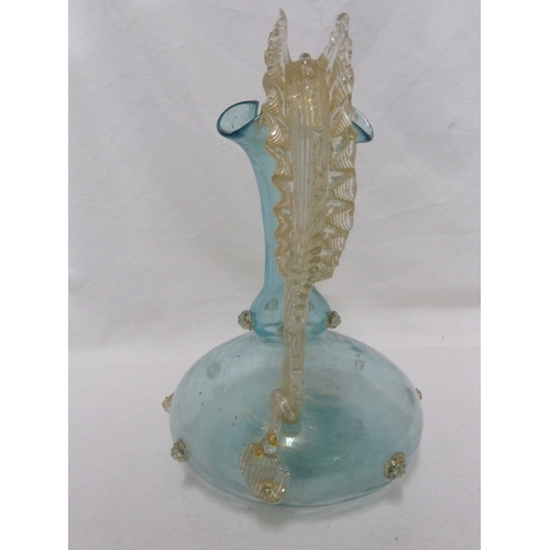 146 - A Venetian glass Dragon jug, of globe and shaft shape the coiled dragon forming the handle, the body... 