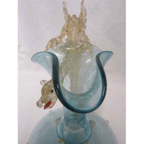 146 - A Venetian glass Dragon jug, of globe and shaft shape the coiled dragon forming the handle, the body... 