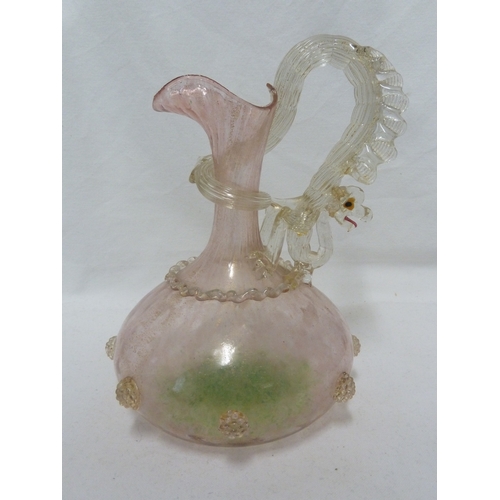 147 - A Venetian glass Dragon jug, of globe and shaft shape the coiled dragon forming the handle, the body... 