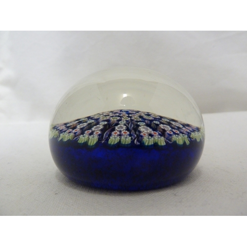 28 - Perthshire Glass - Two cartwheel millifiori glass paperweights, of dark blue ground and a mottled sk... 