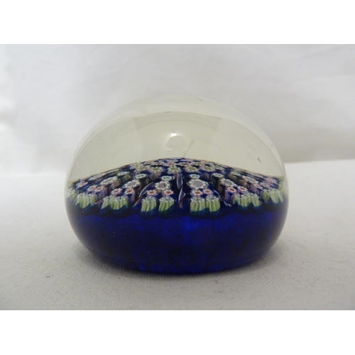 28 - Perthshire Glass - Two cartwheel millifiori glass paperweights, of dark blue ground and a mottled sk... 