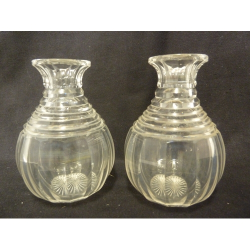 207 - A pair of Regency glass carafes, step cut shoulders, colourless glass, English, 15cm high approx. (2... 