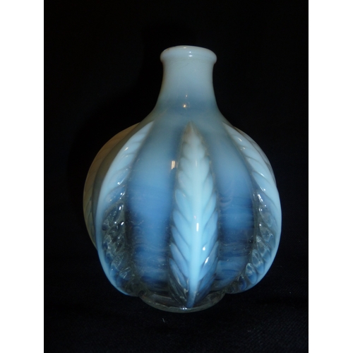 50 - French Glass - an opalescent squat bottle form vase moulded with stiff leaf design, 11cm approx