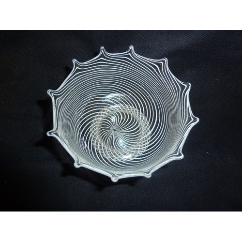 211 - A facon de venise glass bowl, the body with finely worked opaque white spiraled trail beneath a scal... 