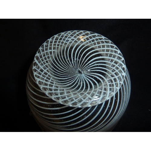 211 - A facon de venise glass bowl, the body with finely worked opaque white spiraled trail beneath a scal... 