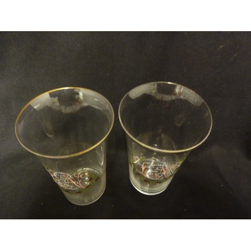 82 - A pair of French glass beakers, probably Baccarat, enamelled with initials and red rose swags, each ... 