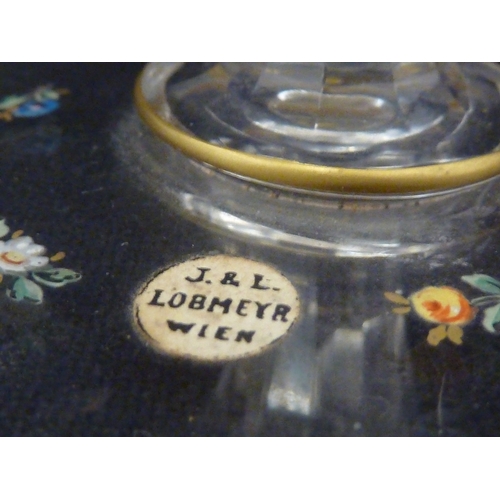 89 - A Lobmeyr glass salt, of boat form on pedestal base, finely enamelled with a vignette of a semi clad... 